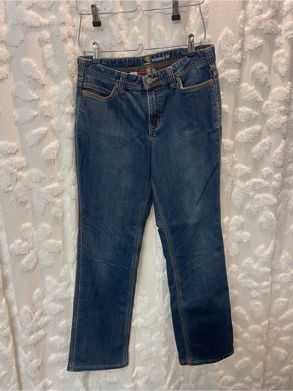 Vintage dark blue Carhartt relaxed jeans with brown stitching